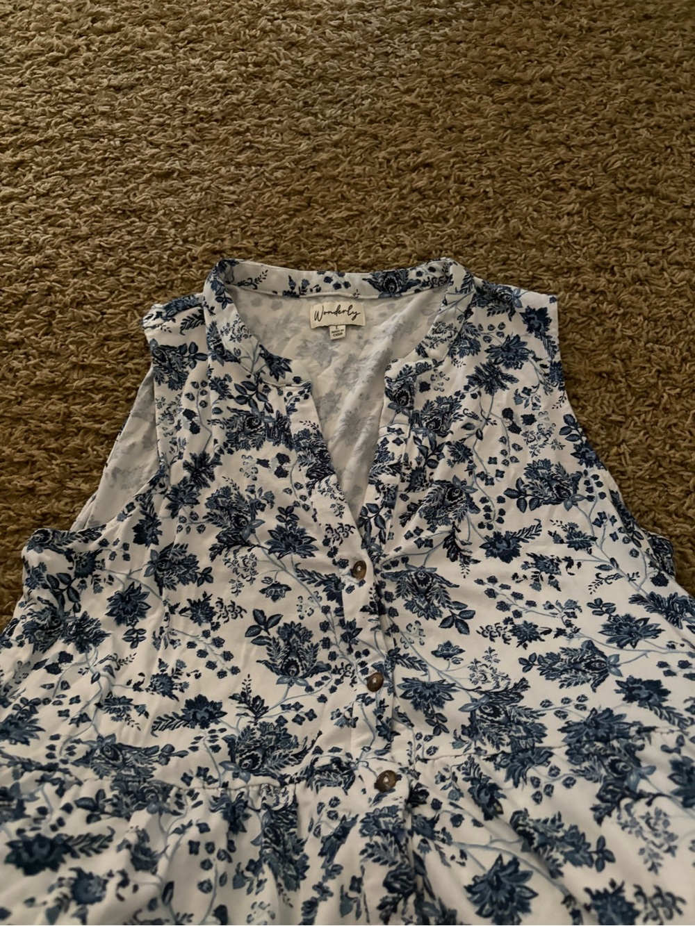 Wonderly White Sleeveless tunic top with Blue Floral Print and button detail